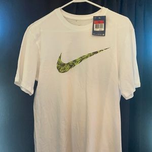 White Nike Tee with Tropical Swoosh.